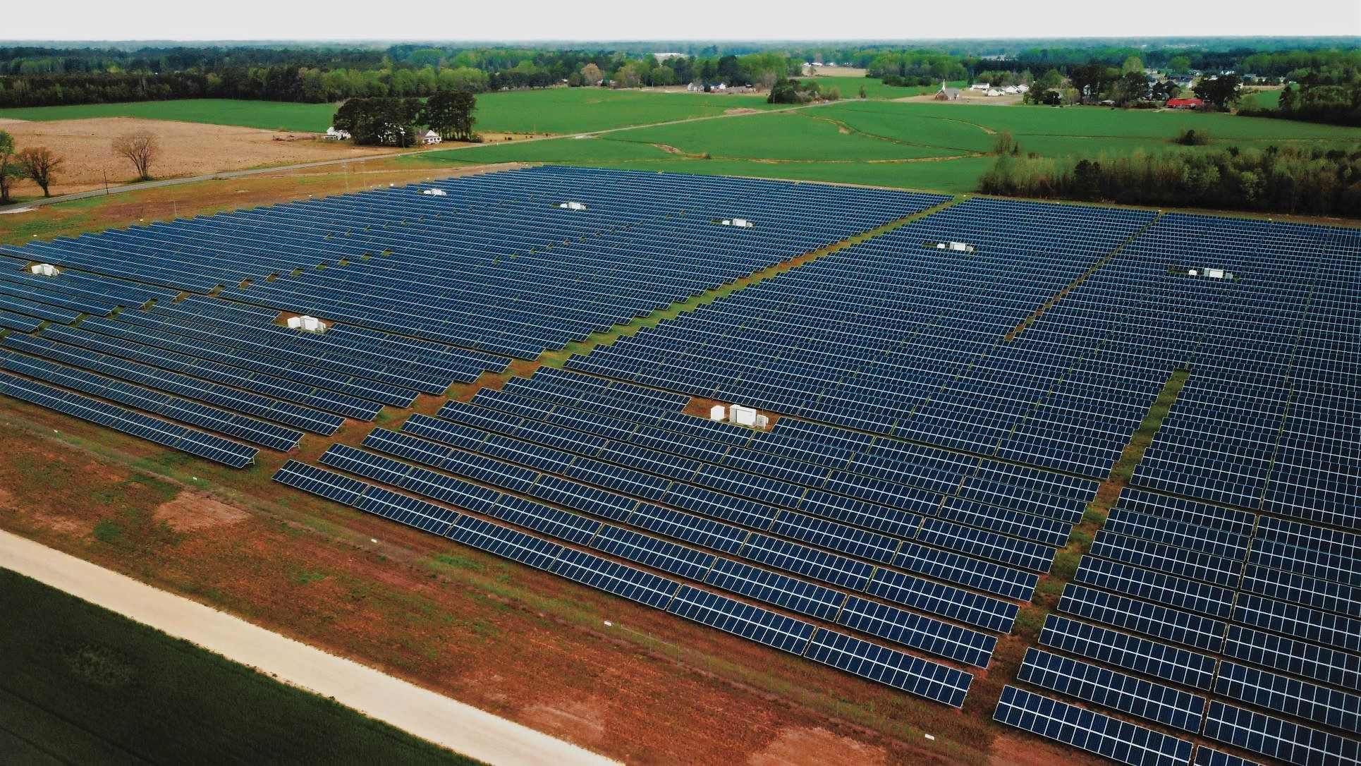 Photo of a field of solar panels.