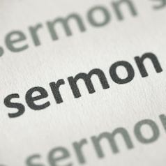 word sermon printed on paper macro