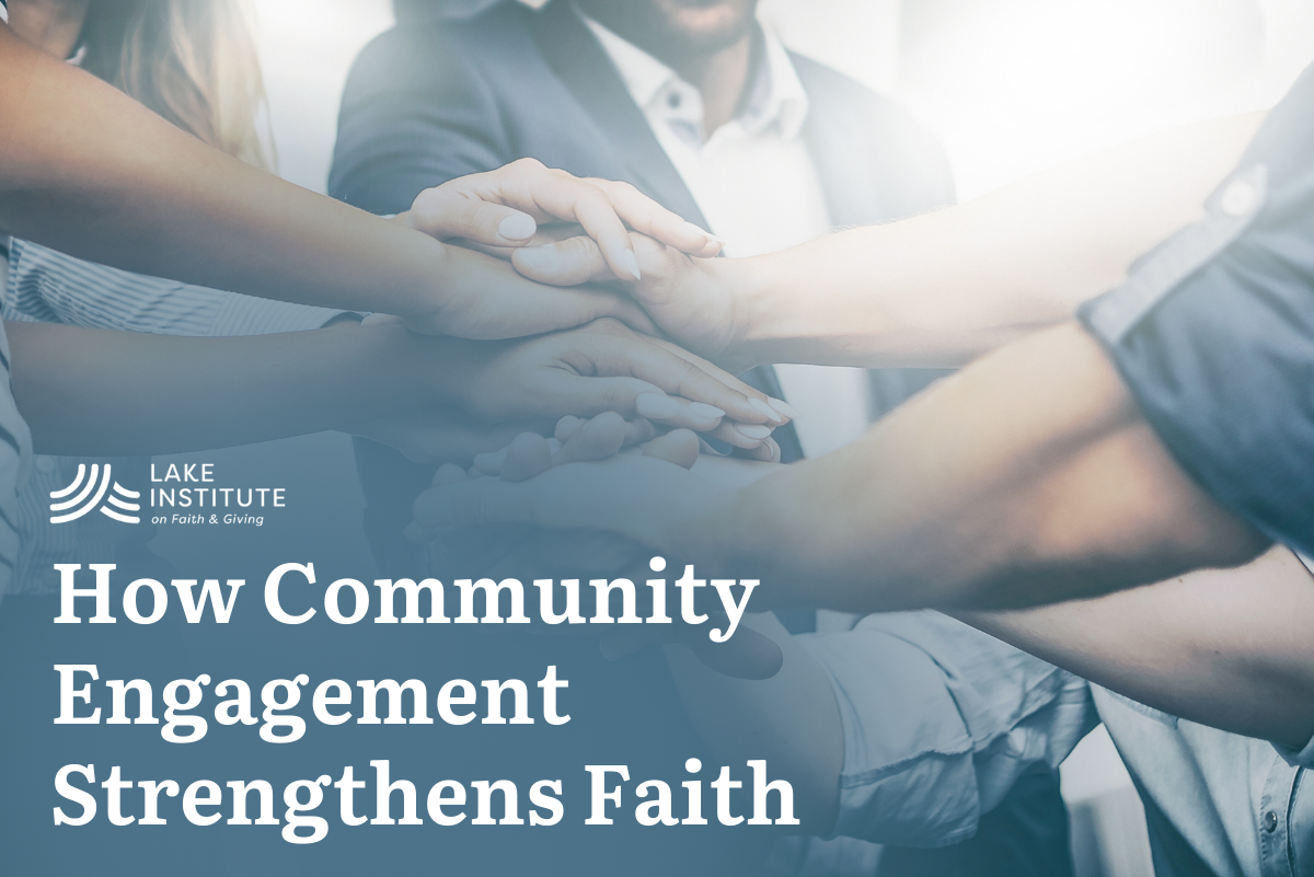 Group of people stacking their hands together