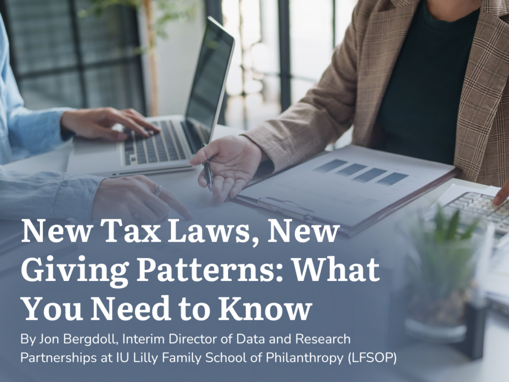 Two women working on taxes at a table