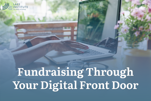 Women typing on laptop with greenery in the foreground